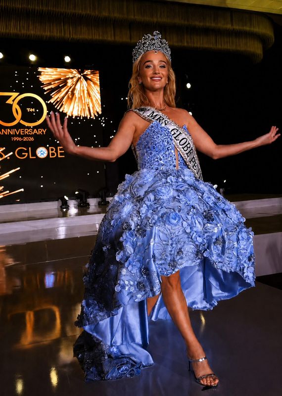 Sapphire-blue beaded pageant gown with crown