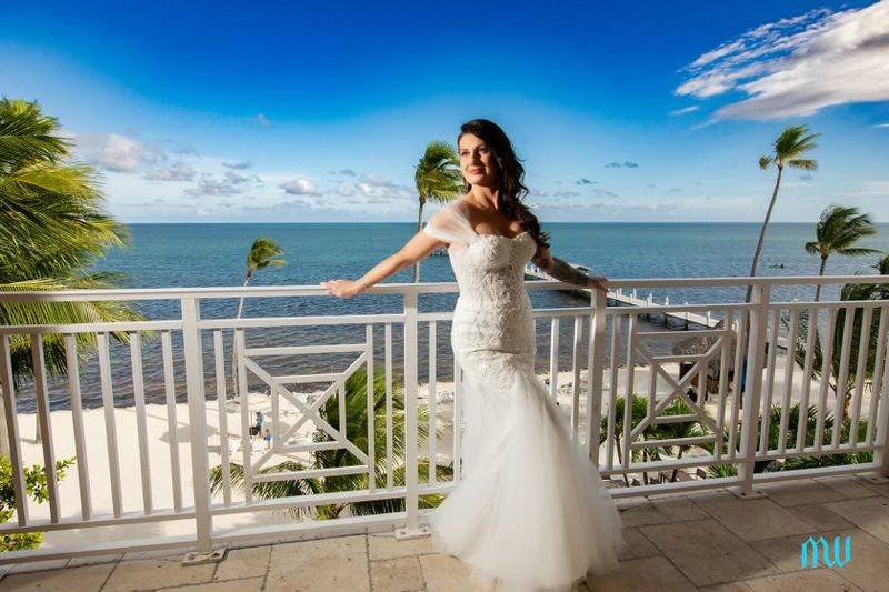 Mermaid wedding gown on an oceanfront balcony